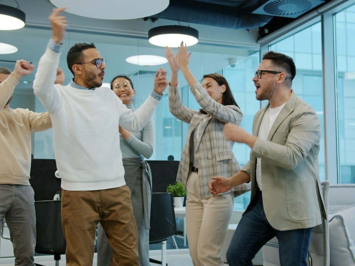 A team celebrating success in the office